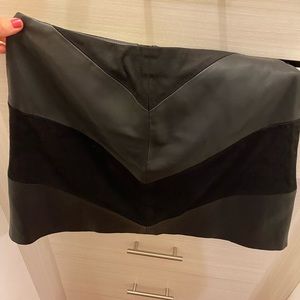 Black faux leather and suade mini skirt